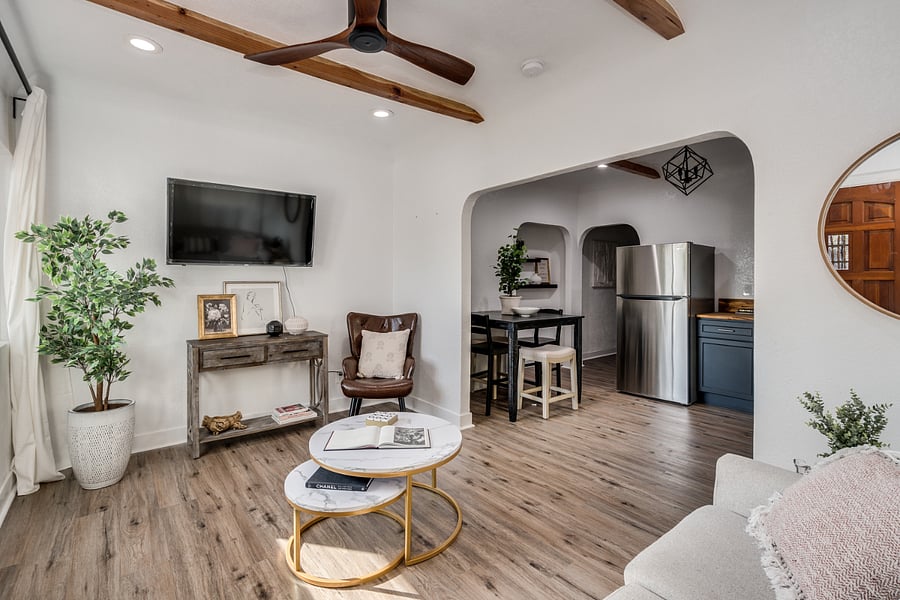 Open floor plan opens up to the living room for modern layout and interior spanish style design.