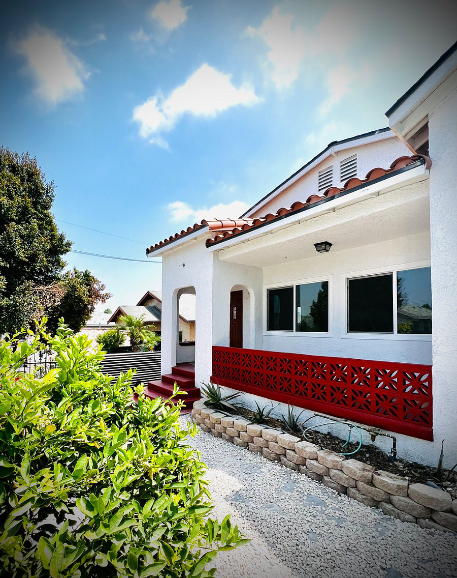 Spanish style exterior with front porch.