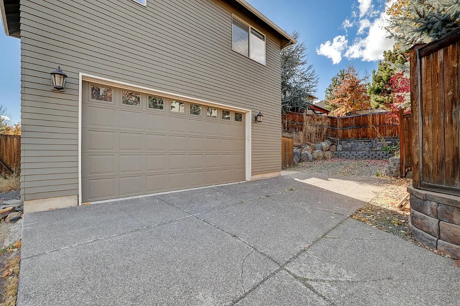 upstairs private ADU with personal parking and stairs to ADU to the right of garage.e