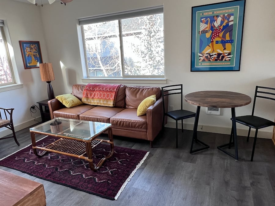 Comfortable light filled living area with new smart TV (not pictured)