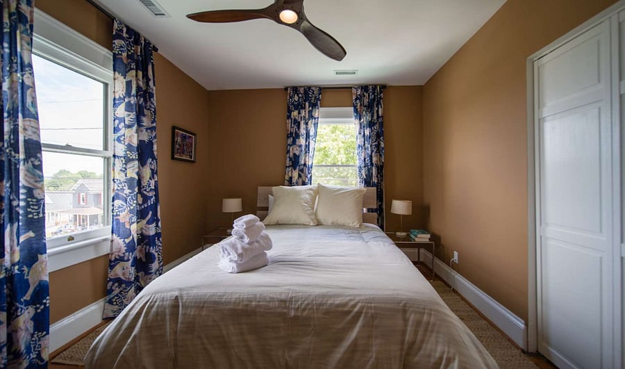 Queen Size Bedroom with dresser and closet.