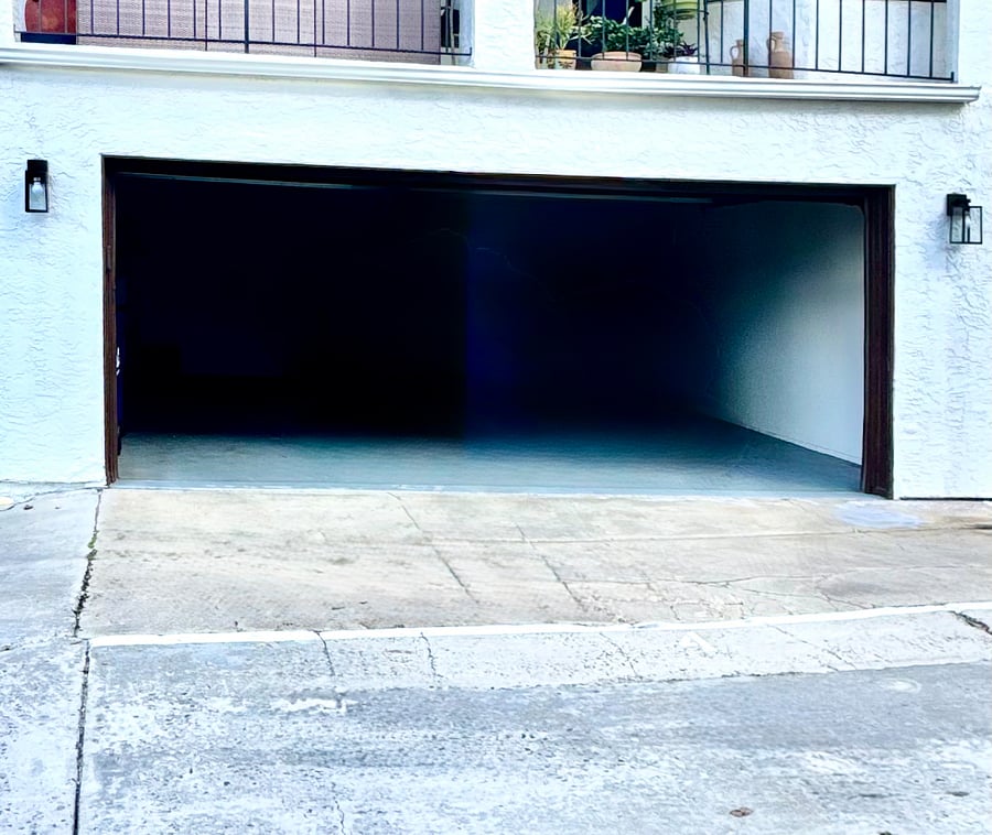 Private, 2-car garage with Level 2 EV charger outlet. Access to courtyard. Automatic garage door opener.