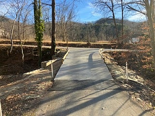 Our private drive is accessible to Ox Creek Road, which runs between Blue Ridge Parkway, Reems Creek Road, and Elk Mountain Scenic Highway.