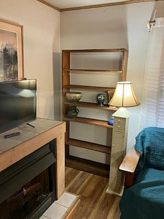 view of shelves, for books, and useful pottery.