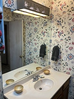 4th view of the master bath with attractive wallpaper decorations.