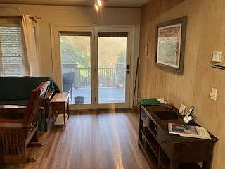 Double entrance door with shads for privacy, and access to the front porch. The front door has a coded security lock so you can't lose the keys. The sofa, front cabiet, has extra storage for kitchen items, and other necessities.