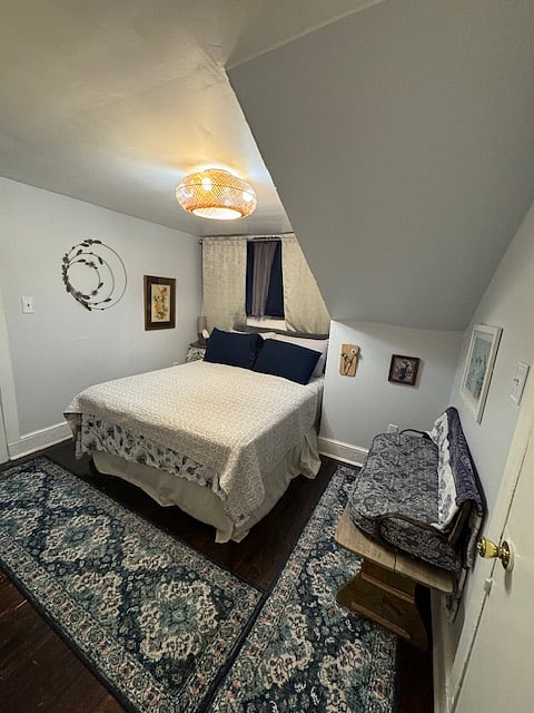 Cozy bedroom with queen bed and comfortable bedding