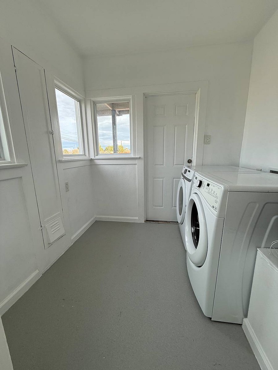 In-unit washer and dryer with dedicated laundry space
