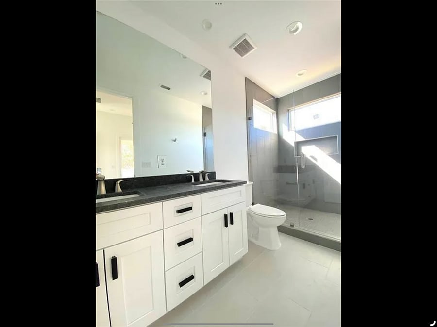 Primary bathroom. Double sink with a lot of storage.