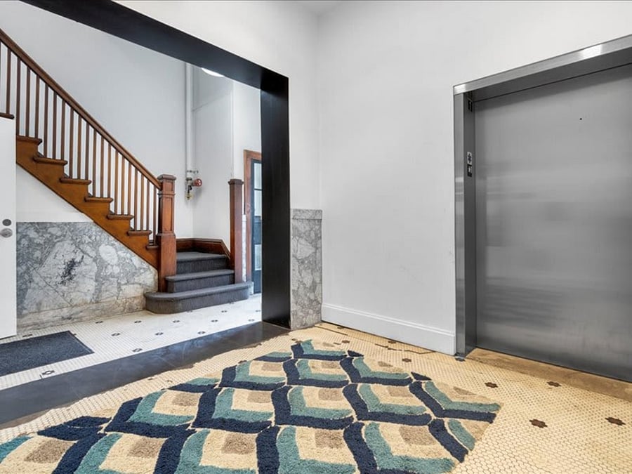 Elevator and beautiful open staircase