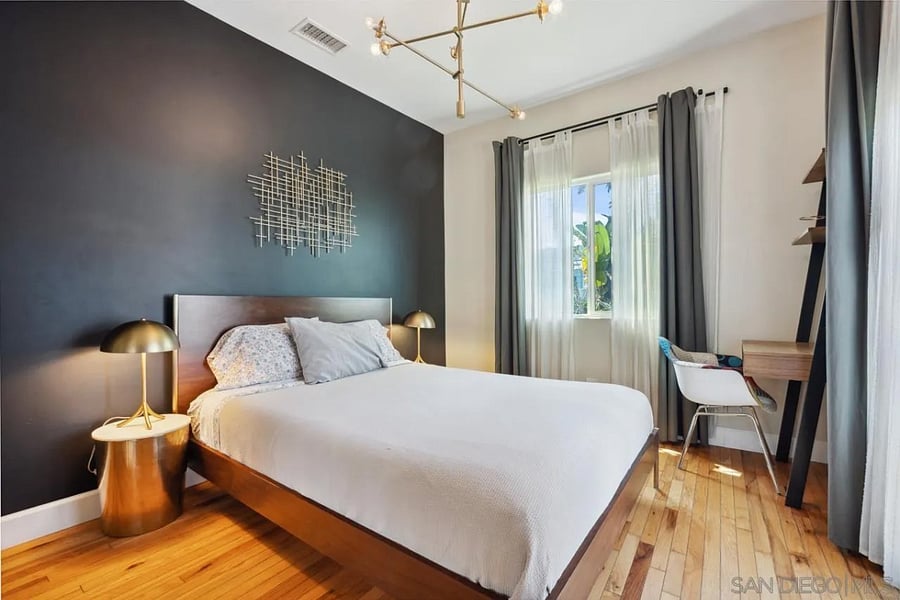 queen sized bed with closet, room darkening shades, french doors to private yard