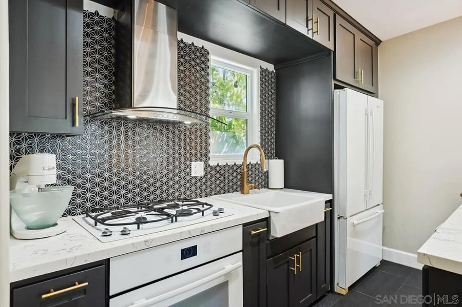 kitchen stove, fridge, cabinets, etc
