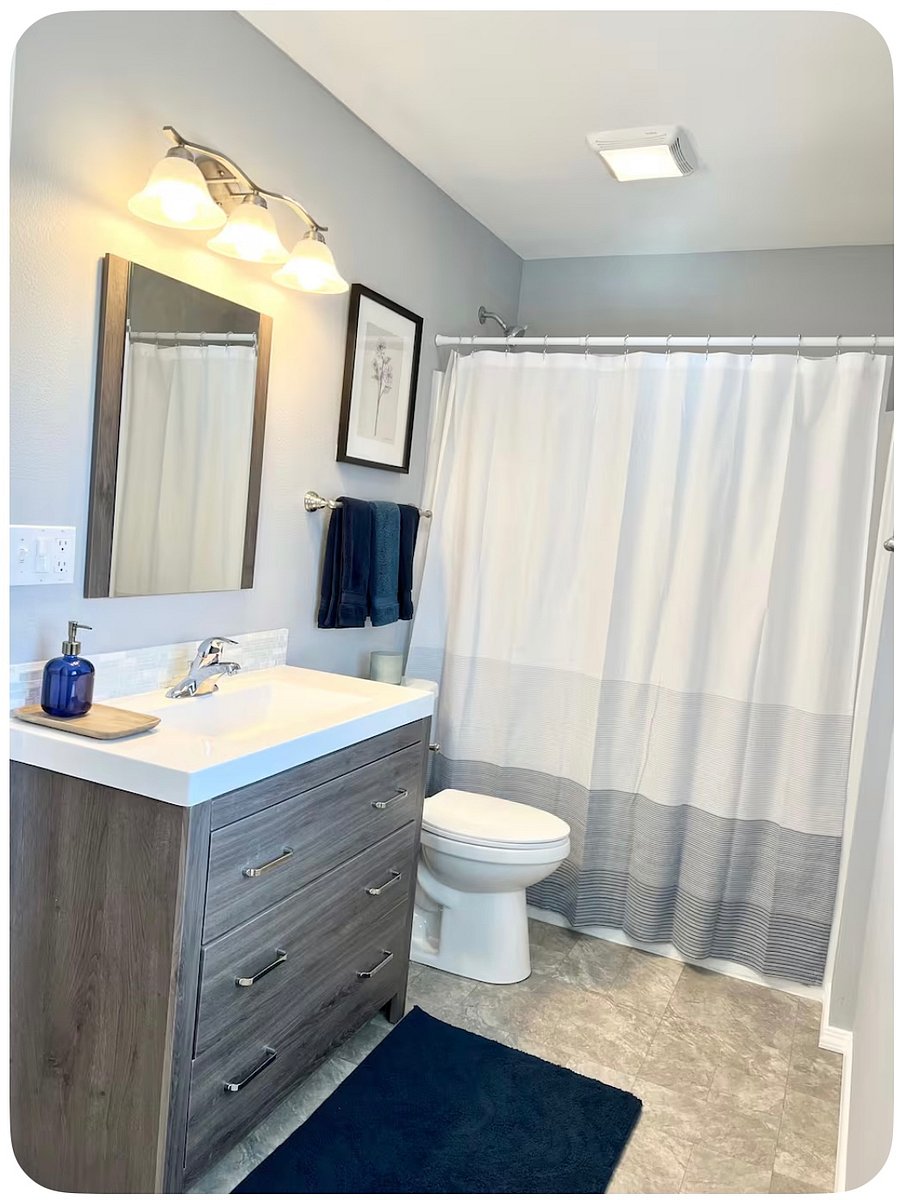 Bathroom with laundry room attached
