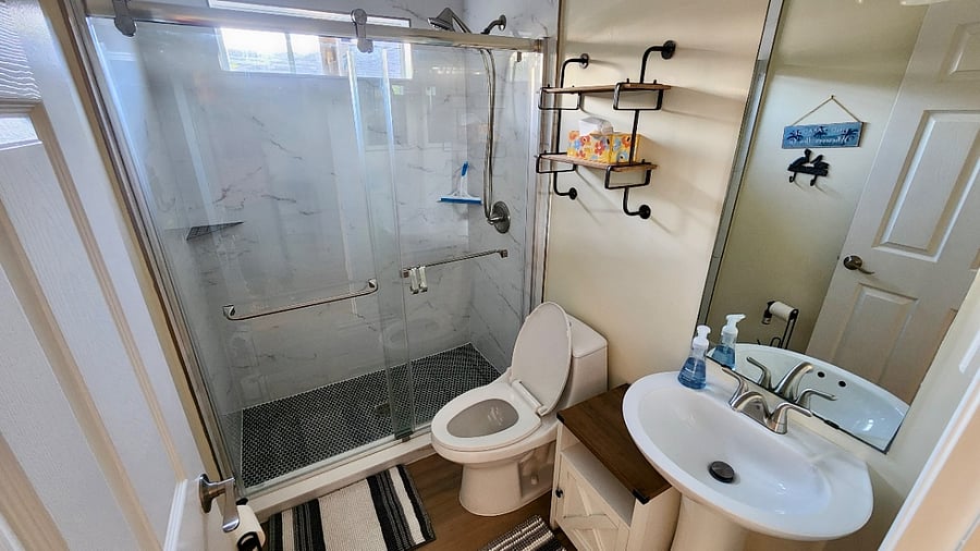 Guest Bathroom 2 with walk-in shower for easy access.
