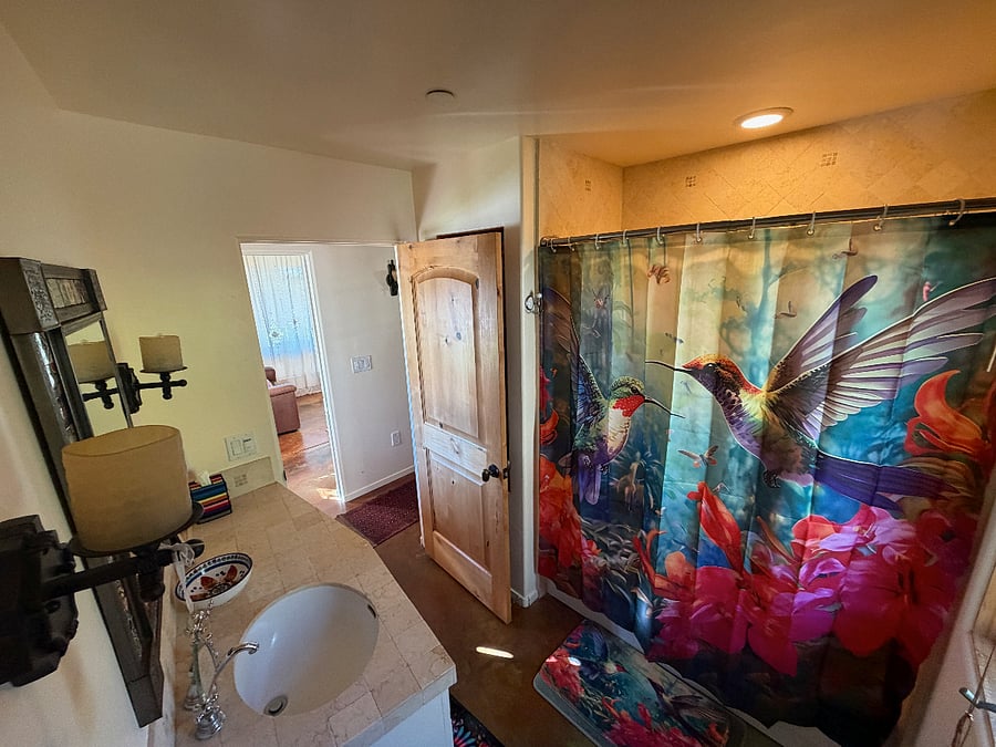 Bathroom across Bedroom 3 with bath tub
