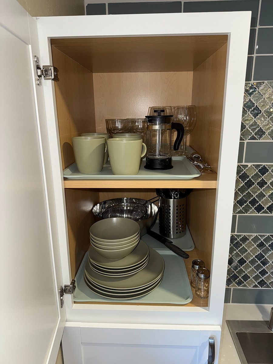Table settings for 4 - plates, mugs, glasses. Also  coffee press and some basic cooking utensils
