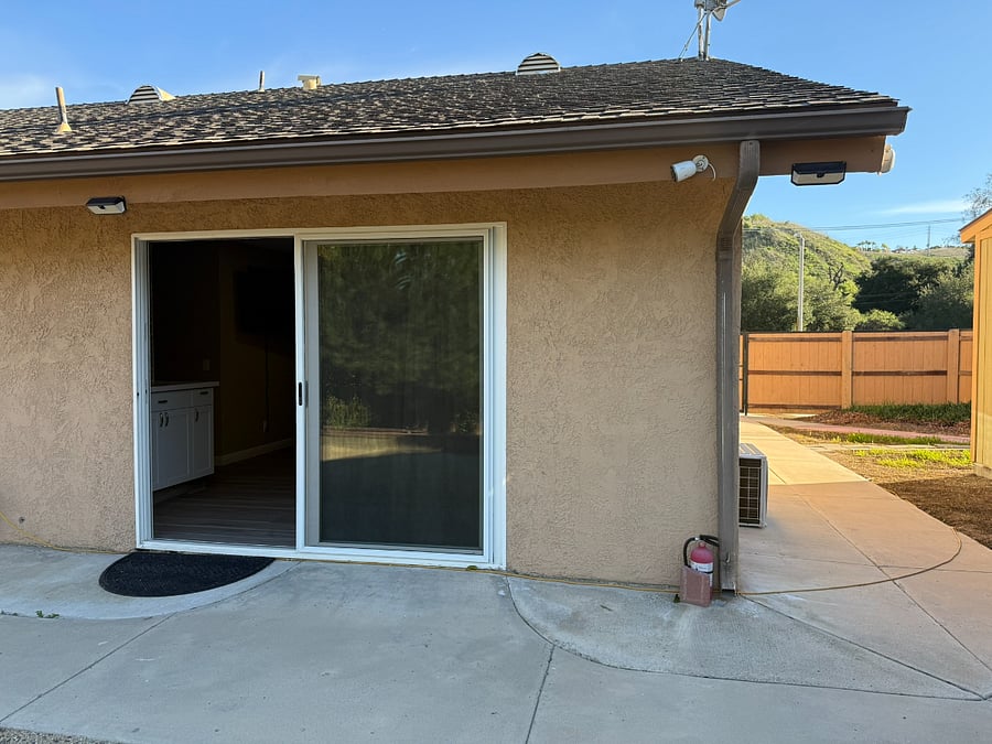 Private entry into unit - at corner minimizing shared walls with the remainder of the house. There are cameras around the perimeter of the house