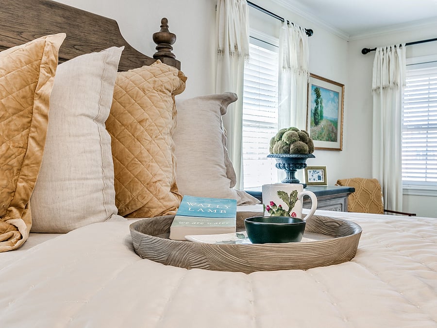 Relax in comfortable queen bed with 65" TV.