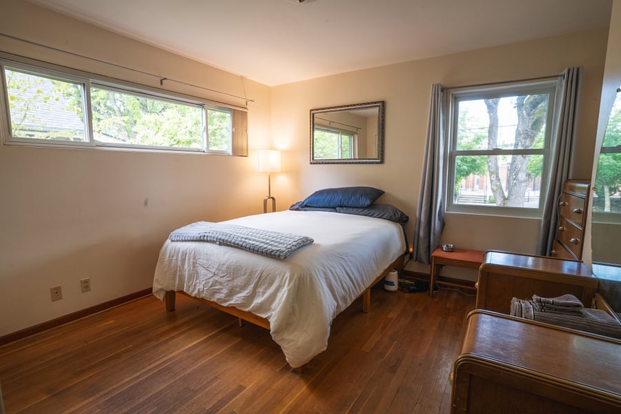 Main floor east bedroom, queen bed