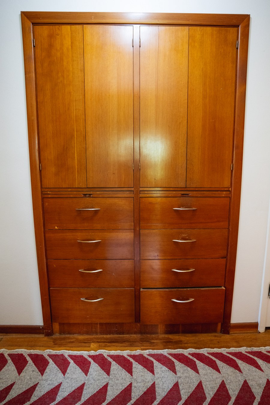 Original built-in on main floor for linens, towels, toiletries.