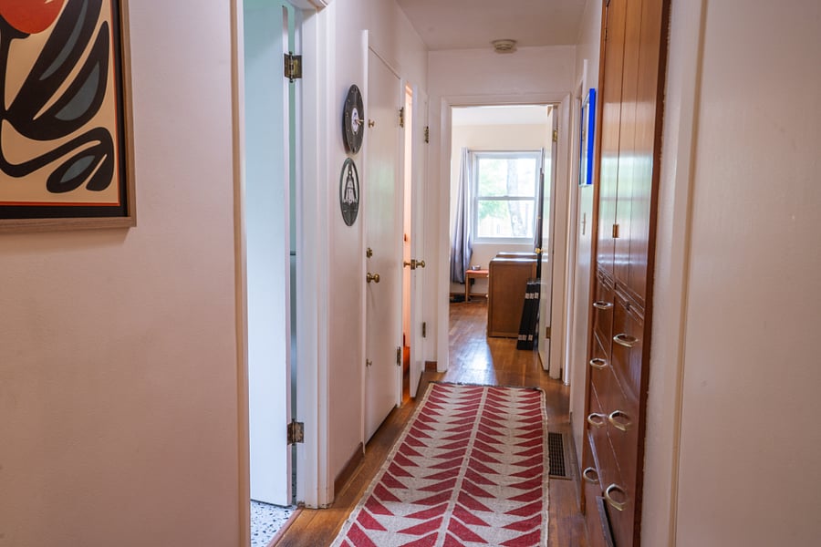 Main floor hallway between east and west bedrooms.