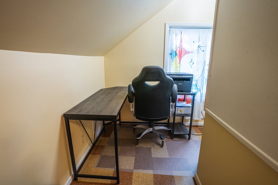Office space upstairs east side, OR this room can also accommodate two twin beds, or a day bed.