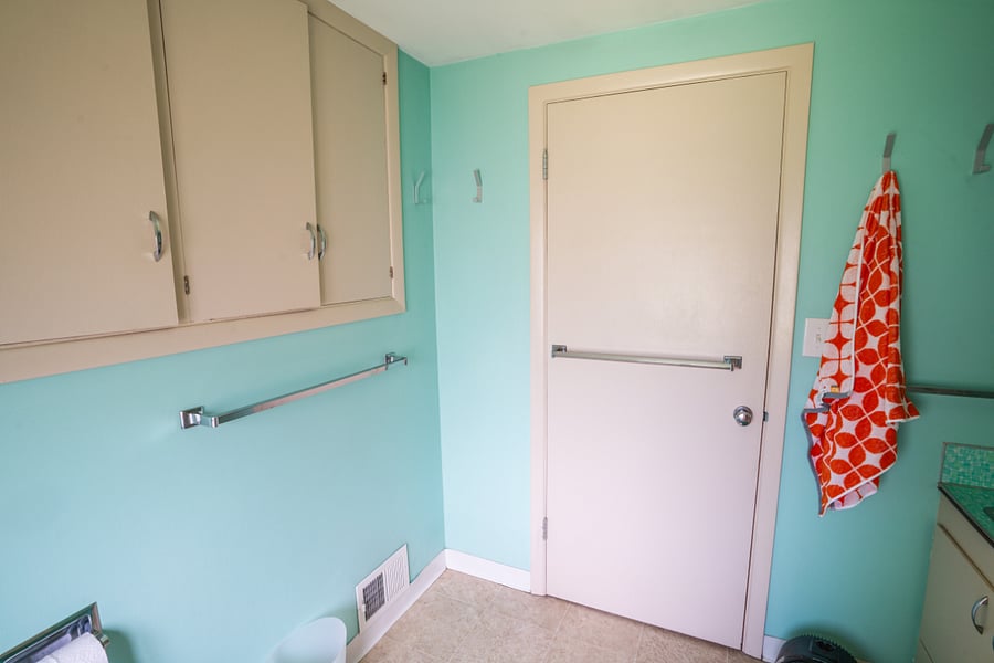 Original built-in shelves for toiletry storage.