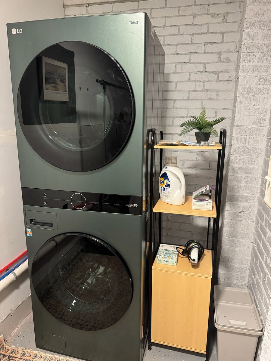 LG smart stacked washer and dryer; basic laundry needs fully stocked