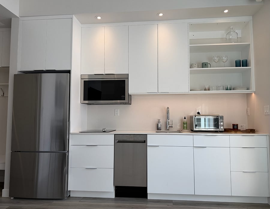 High-end kitchen with electric induction stove and air fryer/induction smart oven