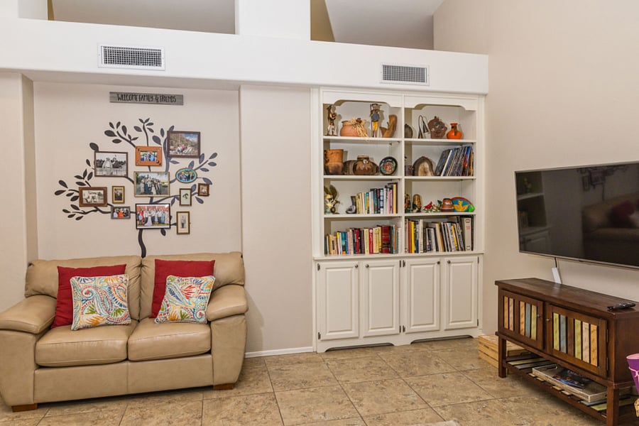 family room with books, games, puzzles, Smart TV, DVD player, and wifi printer, yoga mats