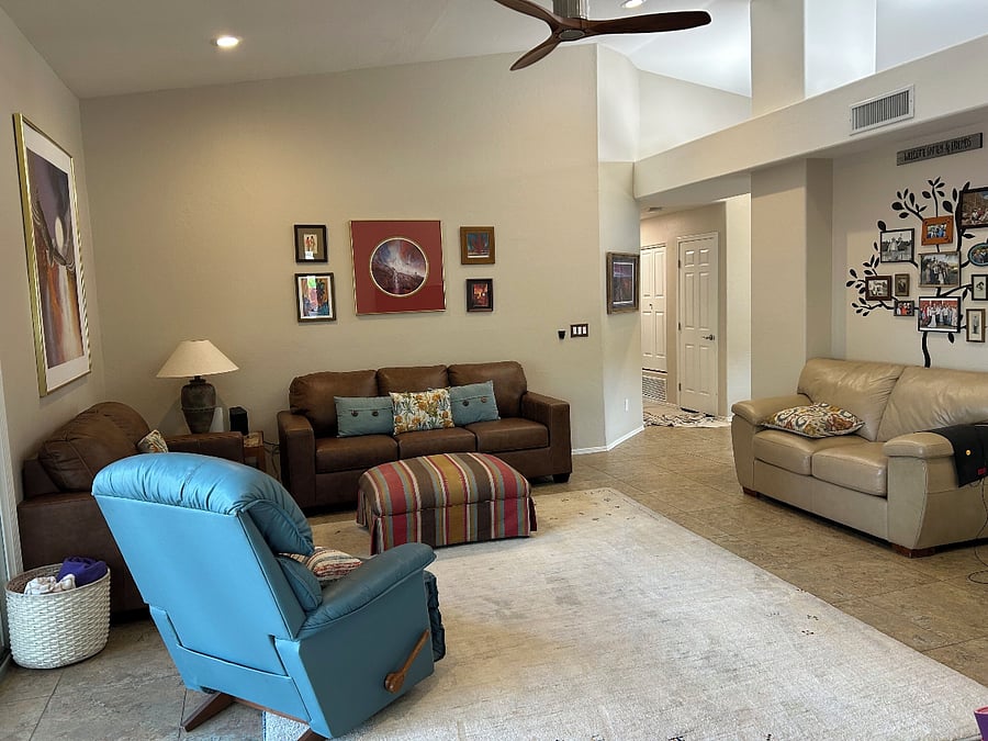 comfortable family room looking towards hallway leading to bedrooms