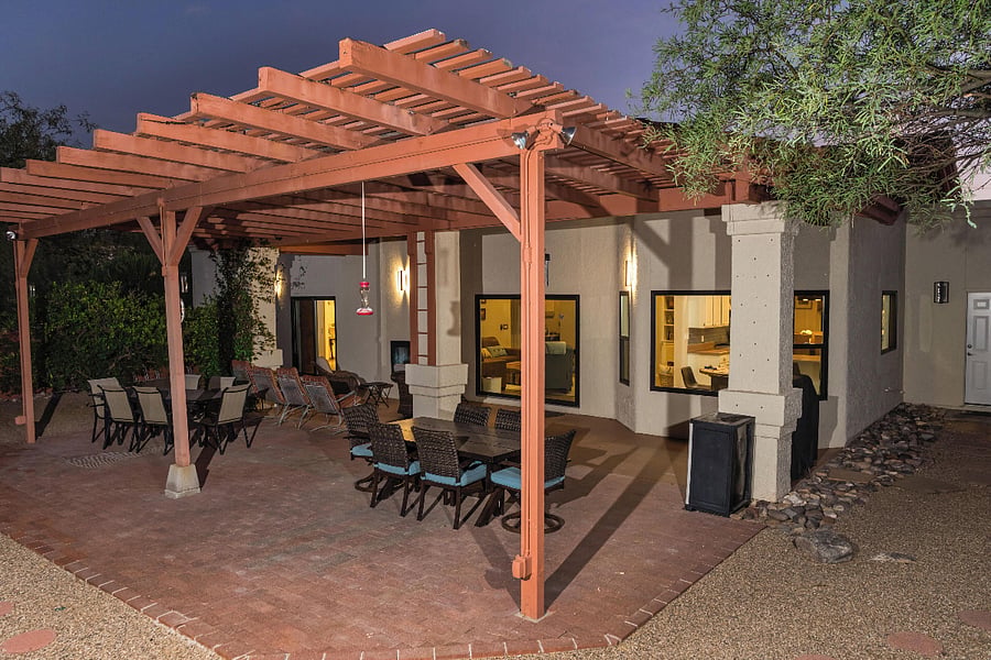Back patio has BBQ grill, 2 tables, outdoor seating, gas fireplace. Great place to enjoy the evening sky
