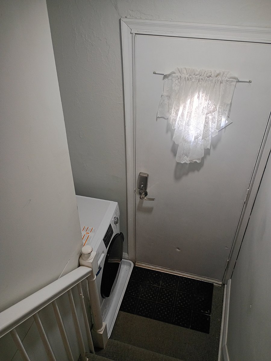 Separate Side Private Entrance, Hallway, & Washer/Dryer combo 