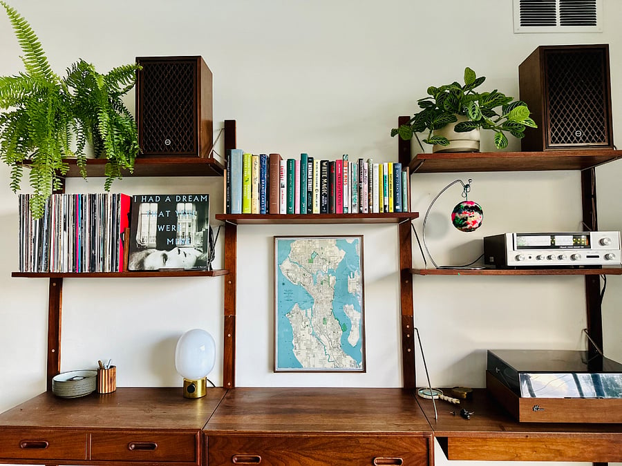 Vintage record player, vinyl and books.
