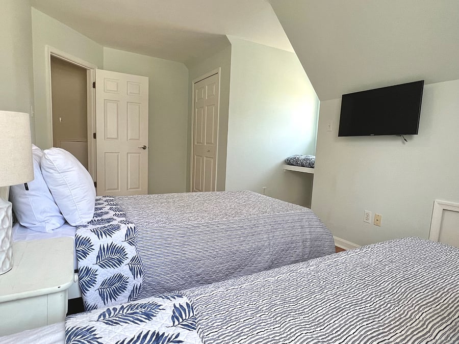 2nd floor bedroom with four twin beds (2 are trundle beds that pull out)