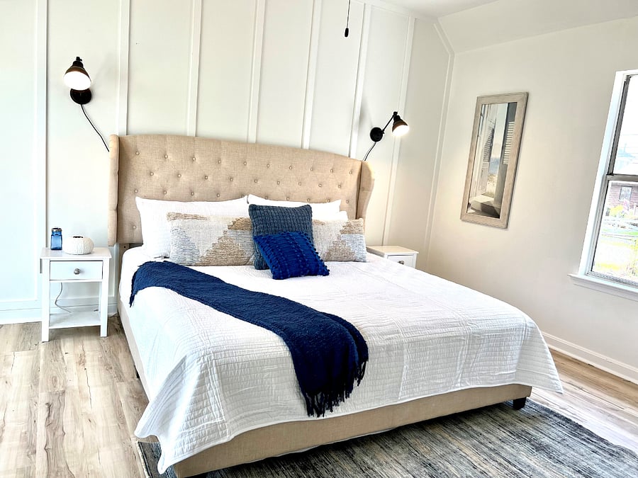Primary bedroom with a king sized bed