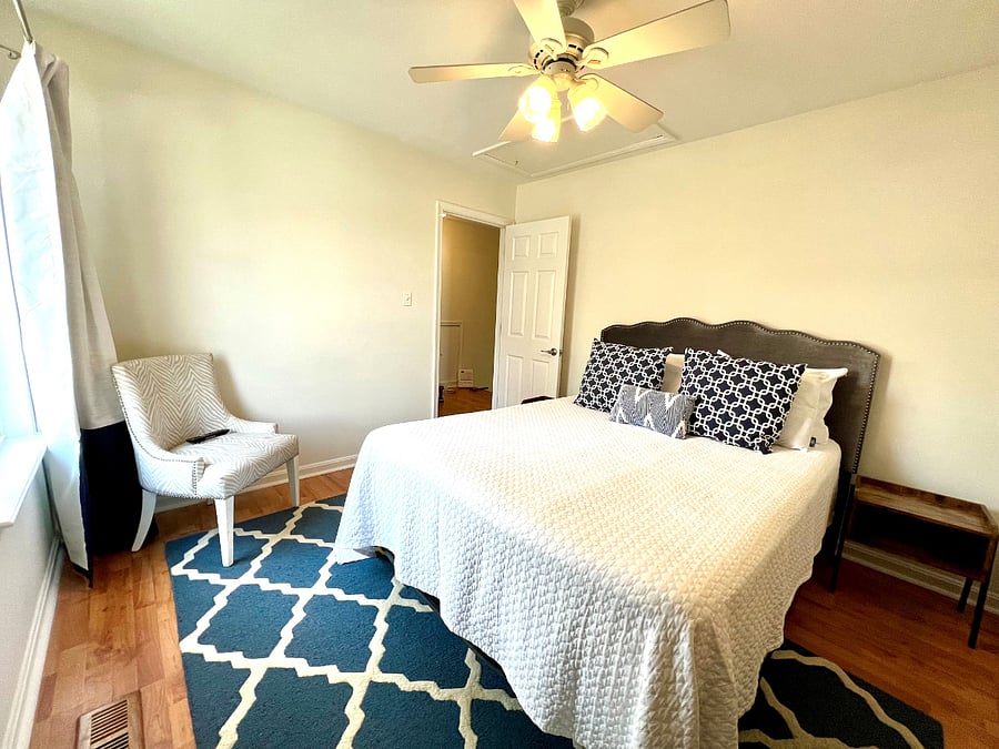 Queen sized bed on 2nd floor