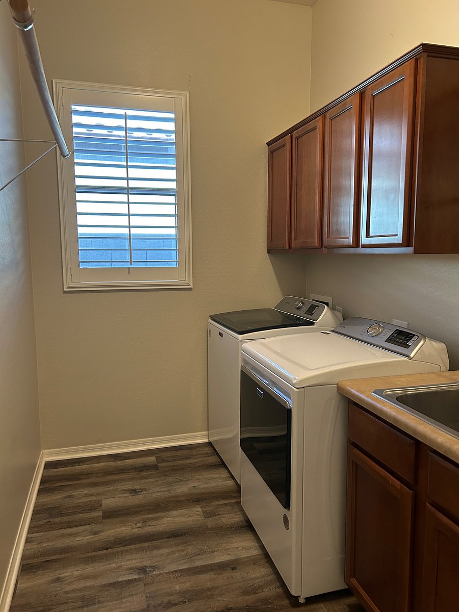 Washer, dryer, ironing board, iron 