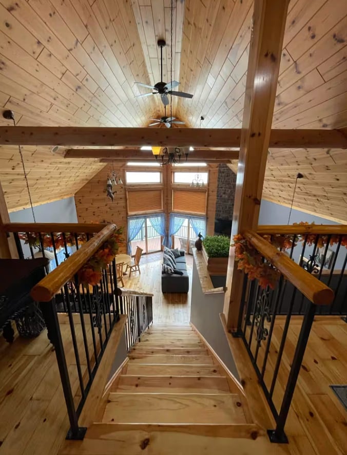 Staircase with open views to the main living area.