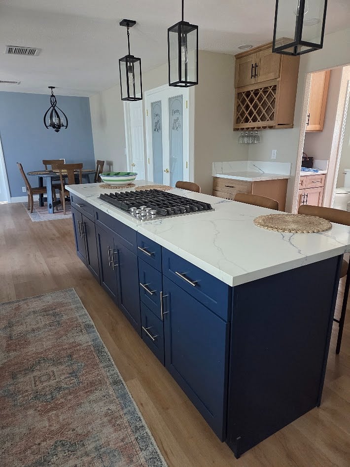 Kitchen Island with Stovetop and Breakfast area for 3
