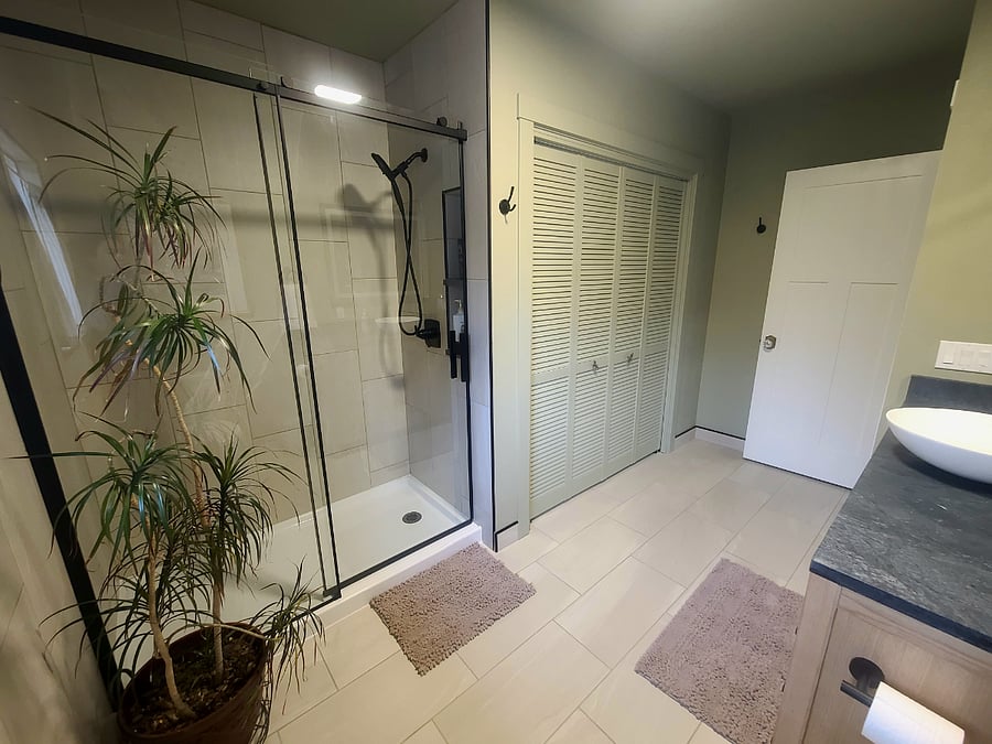 Spa-like bath with walk in shower and laundry.