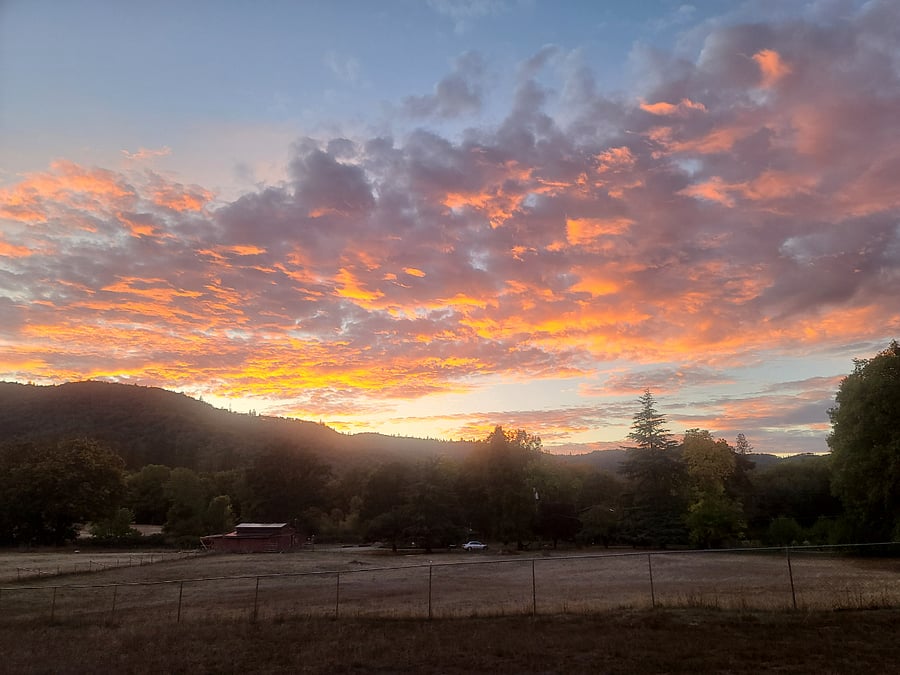Take in sunset views from the private deck, overlooking the foothills and open land.