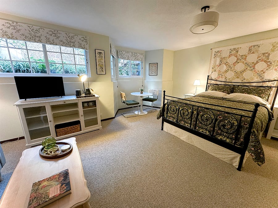 The quilt behind the bed was pieced and hand-quilted by my mother.