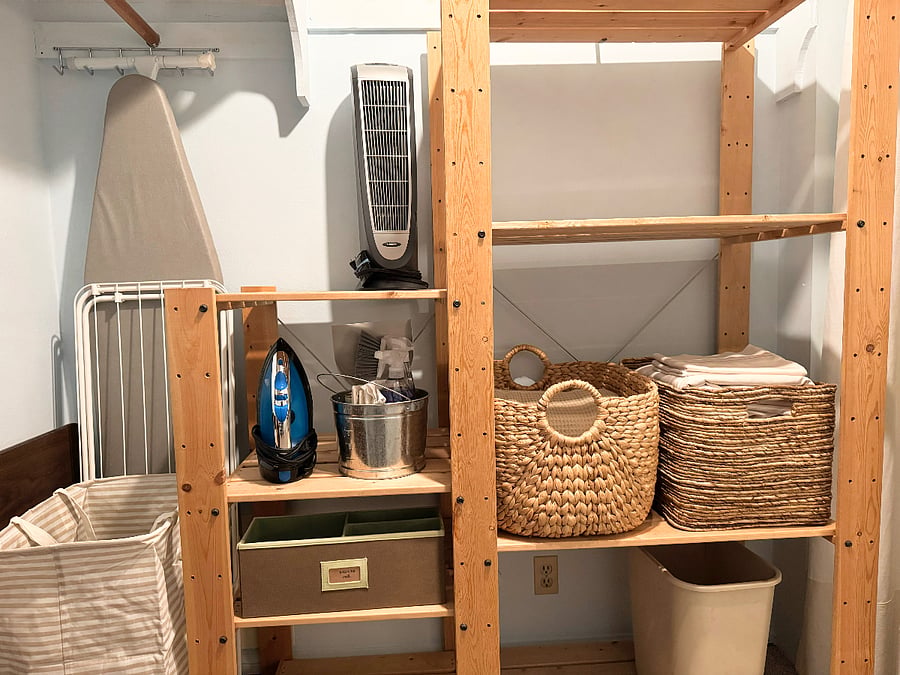 Iron and ironing board, clothes hamper, drying rack, space heater, cleaning supplies, a mail organizer, a shoe rack, ample clothes hangers, and baskets of fresh linens. Not to mention plenty of storage for luggage or other belongings. This was my voice-over studio.