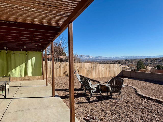 Backyard - Views galore!! Note to pet owners or parents - the back wall is only 3 ft tall with a 15 ft drop to neighbors backyard
