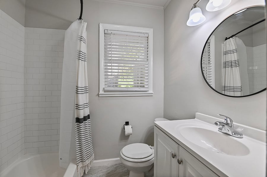 Modernized bathroom with a clean aesthetic and updated fixtures.