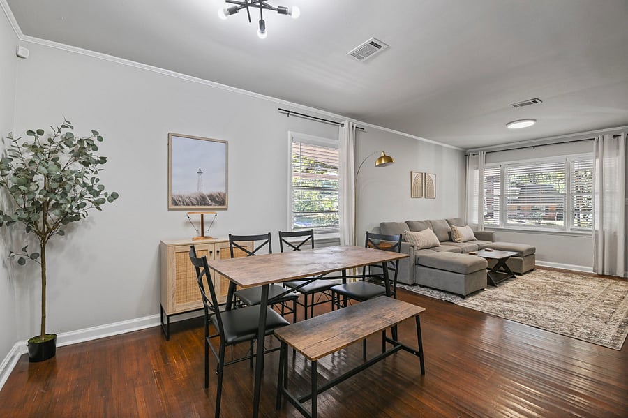 Dedicated dining space perfect for meals or a secondary workspace with plenty of natural light.