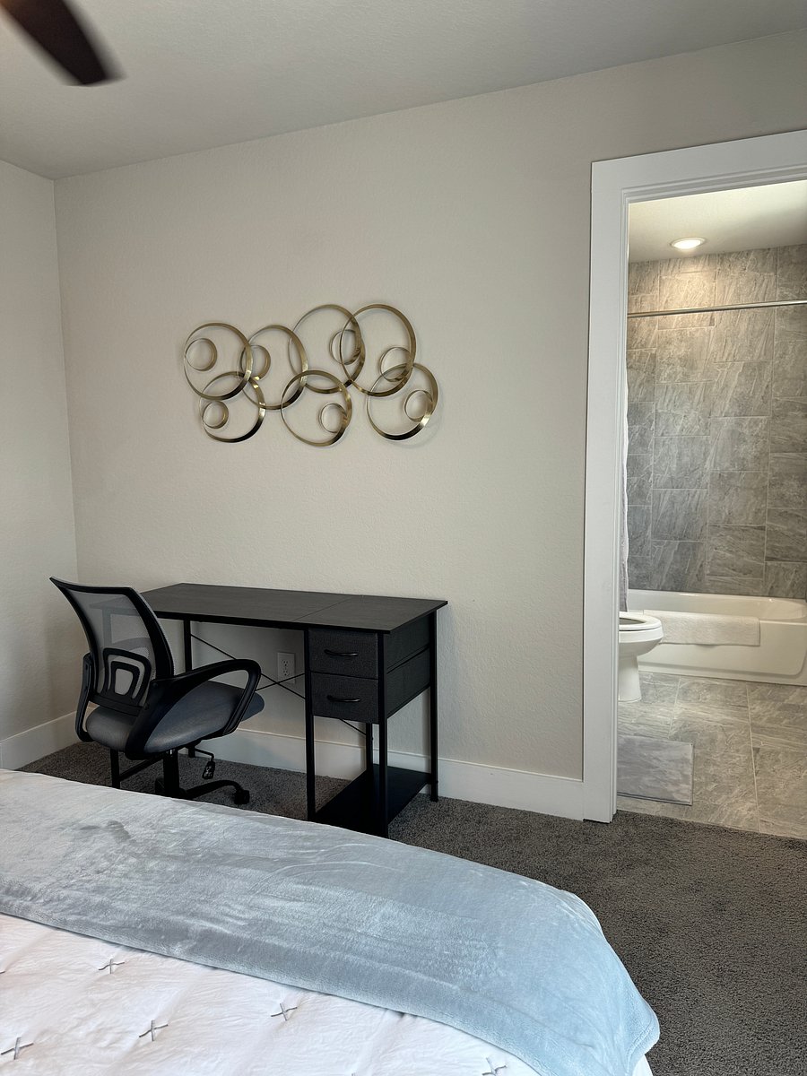 Bedroom 2: Desk/chair and view to the ensuite bathroom