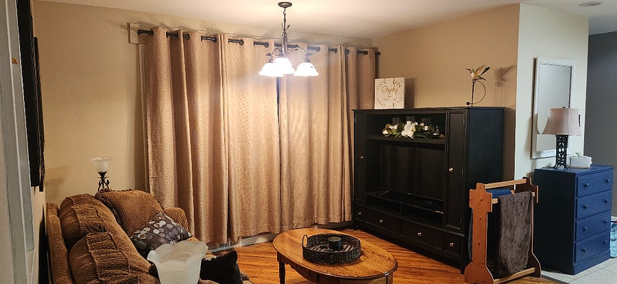 Sitting Area--opposite the fireplace. Couch and 42" Smart Television.