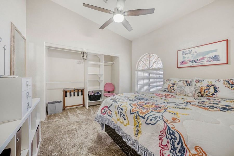 Bedroom 2 with closet and shelving for storage
